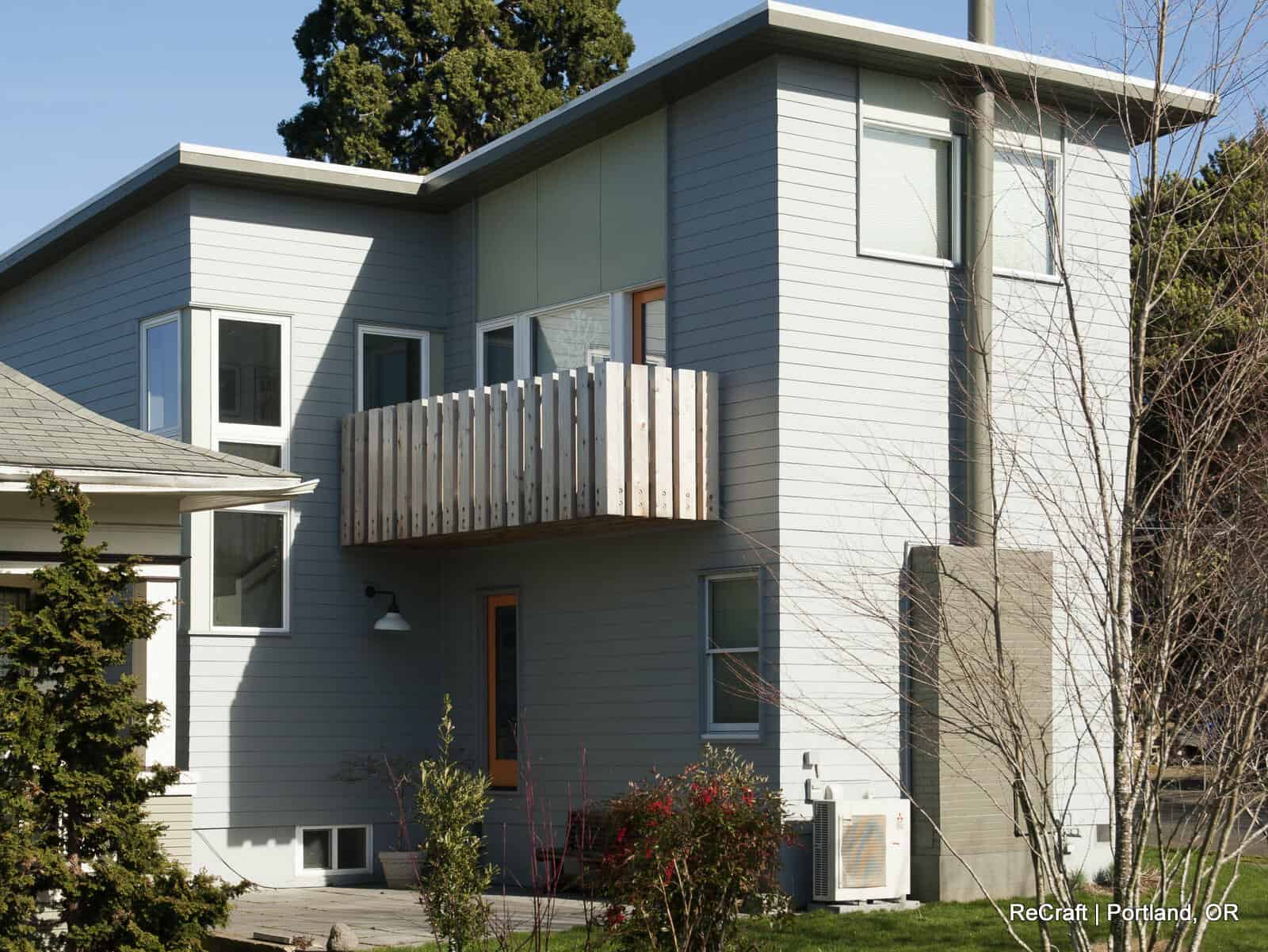 sorcinelli-exterior rear Modern two-story home exterior with a balcony, showcasing ReCraft Home Remodeling's design style in Portland, Oregon.