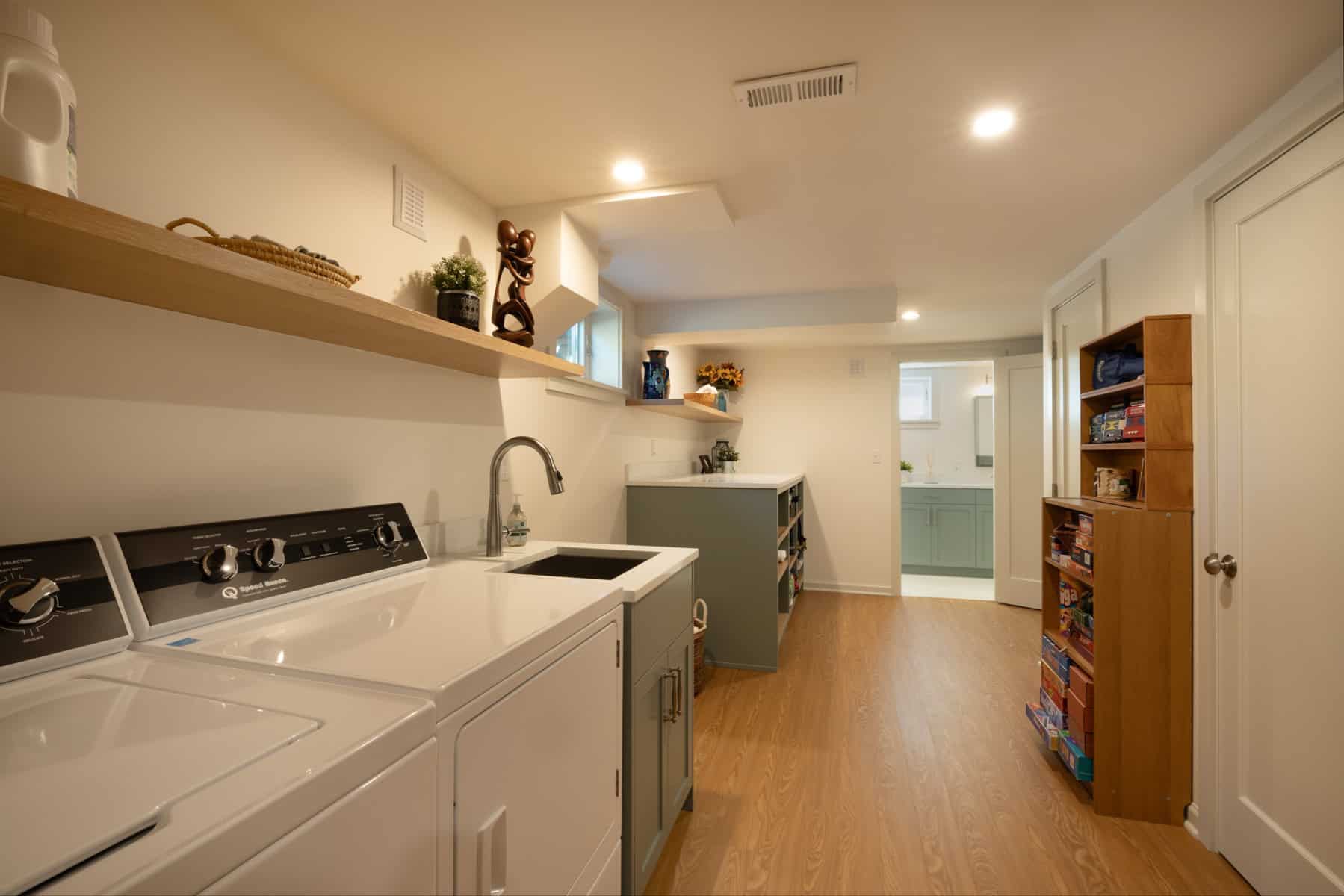 Finished basement laundry room remodel in Portland by ReCraft Home Remodeling.