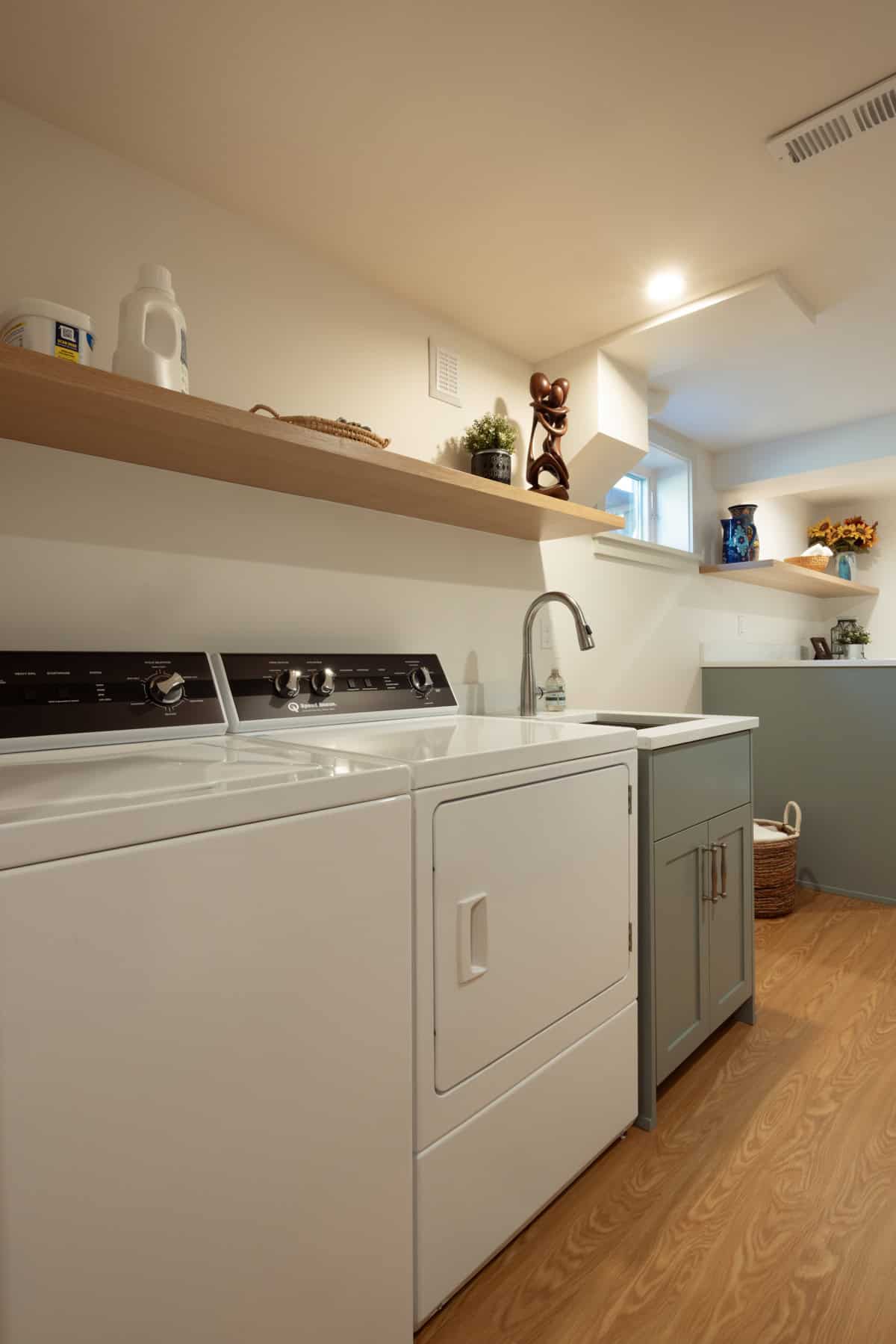 Finished basement laundry room remodel in Portland by ReCraft Home Remodeling.